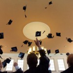 epa02848386 Graduates of the private Economics Highschool Leipzig (HHL) throw their hats into the air as they celebrate their graduation, Leipzig, 30 July 2011. The HHL educates leadership members for the economy. Some 80 students graduated from the highschool 30 July.  EPA/PETER ENDIG