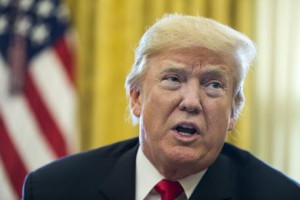 epa06403266 US President Donald J. Trump speaks to members of the news media while signing bills in the Oval Office of the White House in Washington, DC, USA, 22 December 2017. Trump signed the tax bill, a continuing resolution to fund the government, and a missile defense bill before leaving to spend Christmas in Mar-a-Lago, Florida.  EPA/MICHAEL REYNOLDS