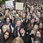 People attend the anti-government, pro-abortion demonstration in front of Polish Pariament in Warsaw, Poland, Saturday, Oct. 1, 2016. (AP Photo/Czarek Sokolowski)