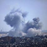 epa04364407 Smoke rises after Israeli air strikes in Beit Lahiya town in the northern Gaza Strip on, 23 August 2014. Three Palestinians were killed and 10 injured in an Israeli airstrike on a house in central Gaza, medics and witnesses said early 23 August 2014. Israel accused militants of breaching a five-day ceasefire by firing cross-border rockets hours before it expired on 19 August 2014. EPA/MOHAMMED SABER