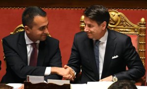 Italian premier Giuseppe Conte (R) shakes hands with Foreign affairs minister Luigi di Maio, ahead of a confidence vote, in Rome, Italy, 10 September 2019.Conte's new government on the day faced the second of two confidence votes in parliament -- in the Senate, after passing the first one in the Lower House a day earlier. His new government is a coalition between the anti-establishment 5-Star Movement (M5S) and the center-left Democratic Party (PD). ANSA/MAURIZIO BRAMBATTI