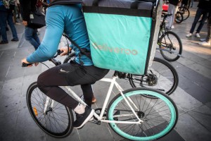 epa07761160 French freelance deliverers for food courier service Deliveroo's gather in Paris, France, 07 August 2019 during a day of protest after Deliveroo company announced a change of their delivery daily rates.  EPA/Christophe Petit Tesson